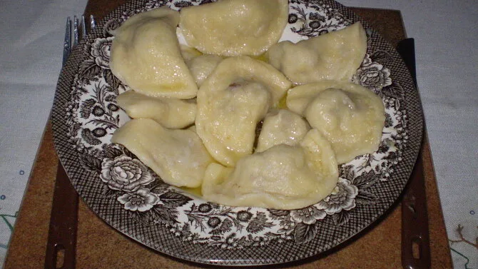 Cooked dumplings on plate