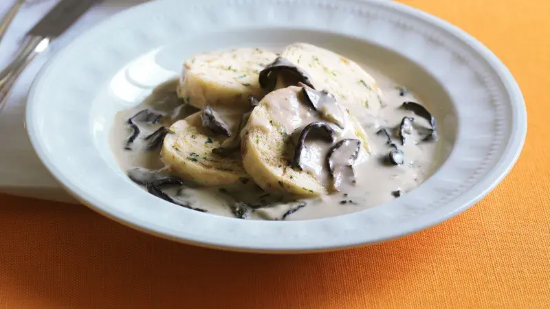 Mushroom cream sauce with dumplings