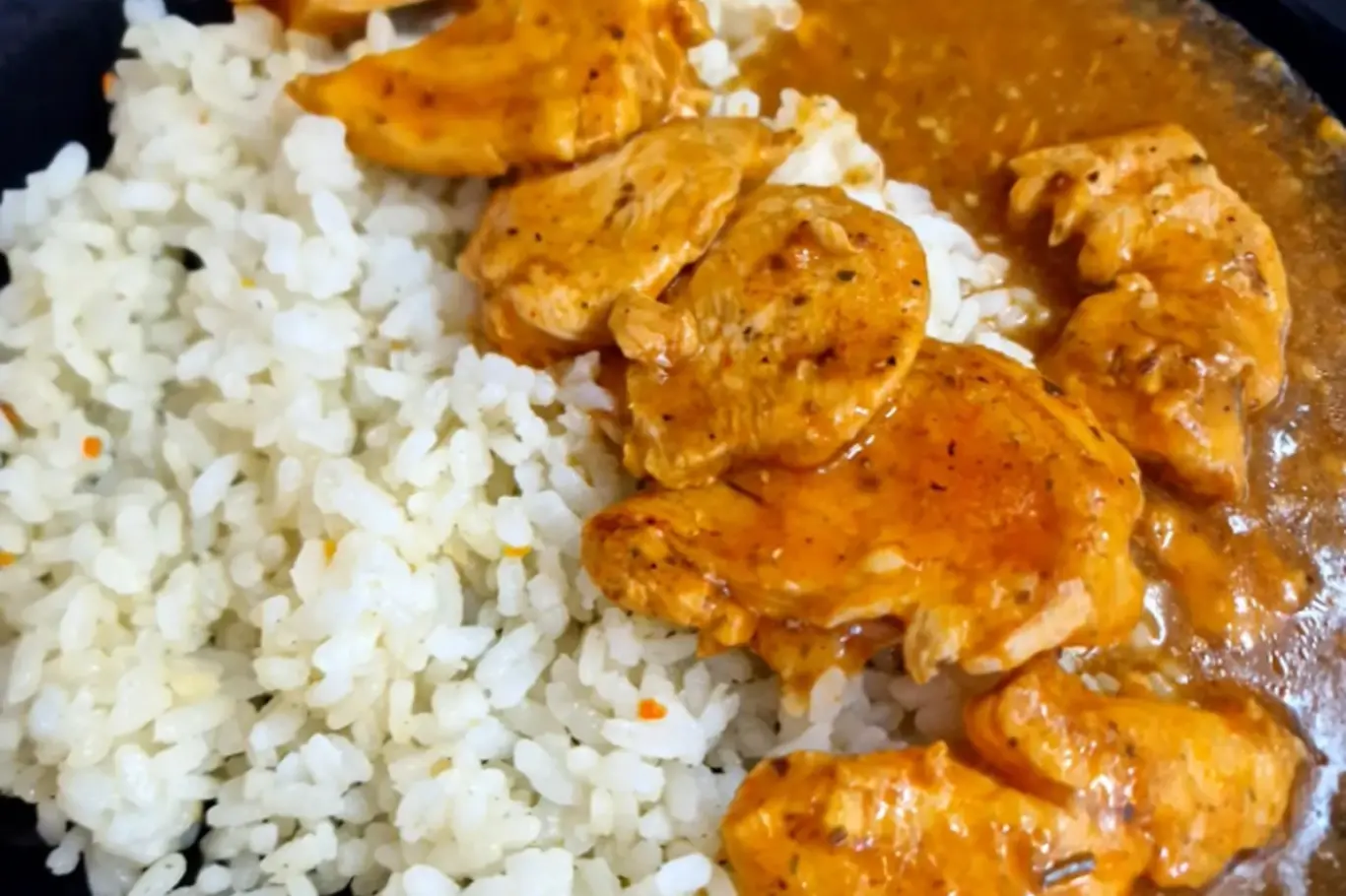 Chicken with rice and sauce