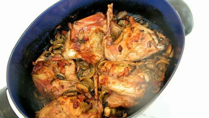 Roasted rabbit with mushrooms and bacon