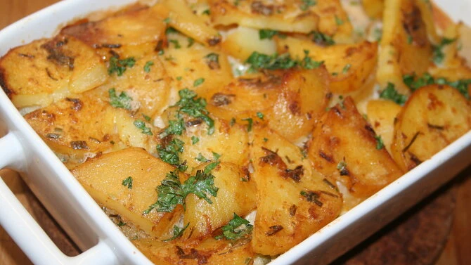 Baked potatoes in dish