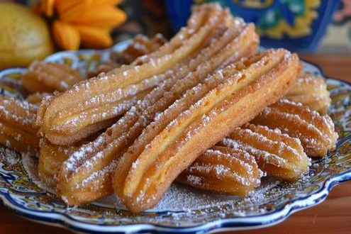Churros with powdered sugar
