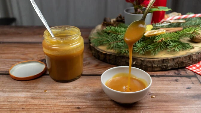 Homemade caramel sauce pouring
