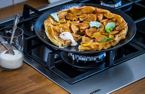 Apple upside-down cake in pan