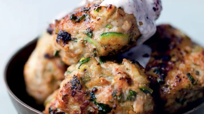 Zucchini and potato patties with sauce