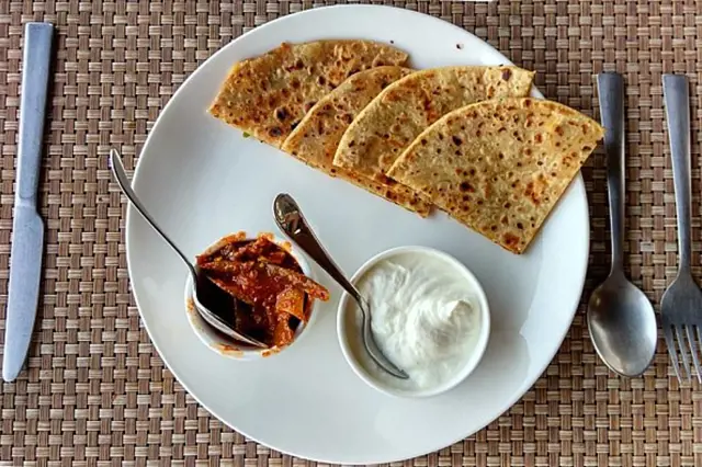 Homemade flour pancakes with sides