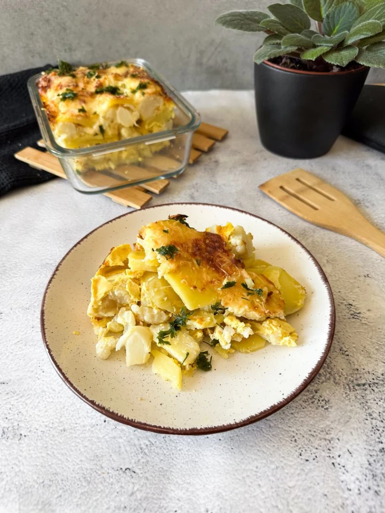 Baked cauliflower casserole with potatoes and cheese