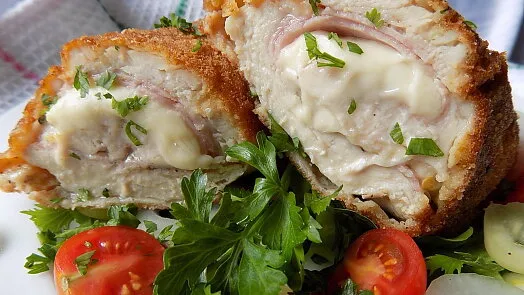 Breaded chicken cutlet with ham and cheese filling