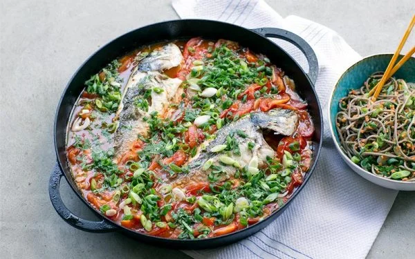 Fish in tomato sauce with noodles