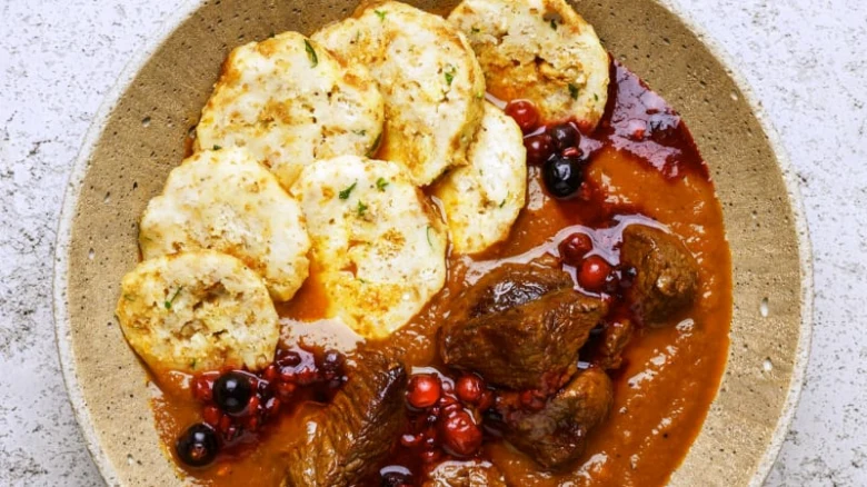 Dumplings with meat and berries
