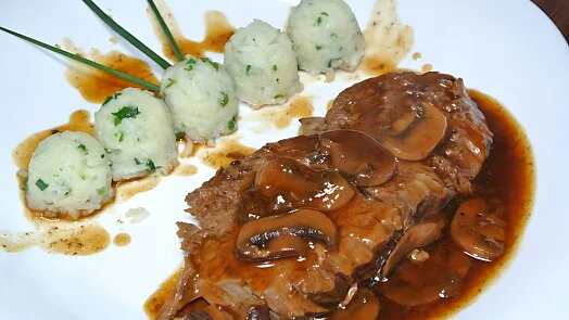 Beef roast with mushrooms and dumplings
