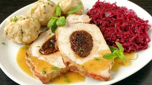 Sliced pork loin with stuffing and dumplings