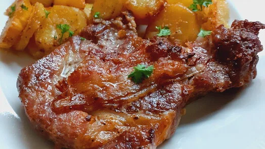 Roasted pork chop with potatoes